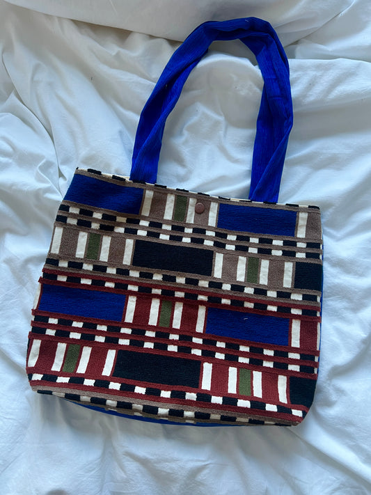 One of one mixed colour bag